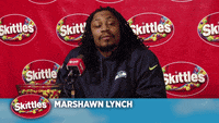Jumping Marshawn Lynch Gif By Team Coco Find Share On Giphy