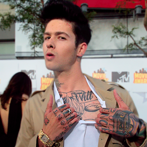 T. Mills Showcases His Love of Tattoos in 'She Got A' Video