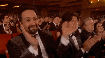 Celebrity gif. In the audience at the Tony Awards, Lin Manuel Miranda applauds enthusiastically and says, “that’s right.”