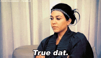 Reality TV gif. Kourtney Kardashian sits with her arms crossed. She has a slightly serious look on her face and nods as she says, “True dat.” 