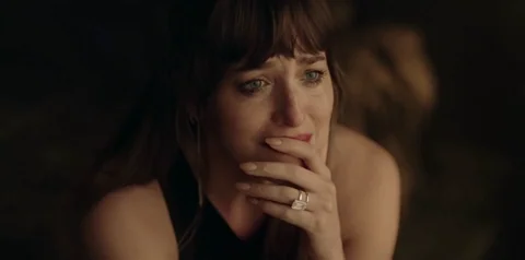 Sad Dakota Johnson GIF