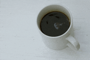 cup of coffee nom GIF