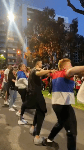 Djokovic Fans Dance Outside Melbourne Hotel