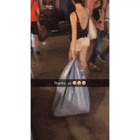 Video gif. Snapchat video of a woman shopping and dragging around a huge shopping bag. Text, "Thanks ya."
