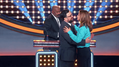 celebrity family feud kiss GIF by ABC Network