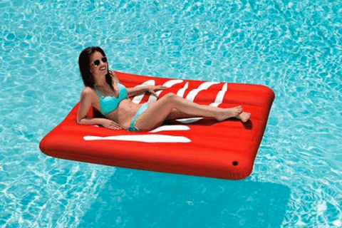 emoji pool floats GIF by Product Hunt