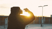 spokeworld water drinking wellness sunset GIF