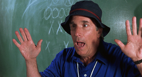 Movie gif. Henry Winkler as Coach Klein holds his hands up as if surrendering and says, "I don't know where I am." The clip shuffles and spins before coming back together.