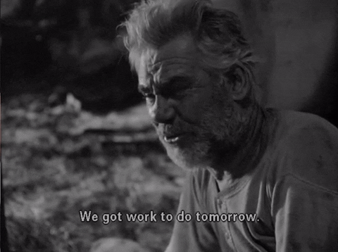Movie gif. Humphrey Bogart as Dobbs in The Treasure of the Sierra Madre wearily crouches saying, "We got work to do tomorrow."