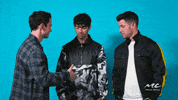 nick jonas handshake GIF by Music Choice