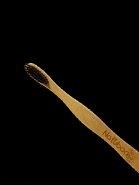 Natuboo black wave bamboo toothbrush GIF