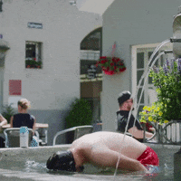 Calanda beer bier fountain hairflip GIF