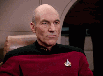 TV gif. Patrick Stewart as Jean-Luc Picard from Star Trek stoically points offscreen as he speaks. Text, "Make it so."