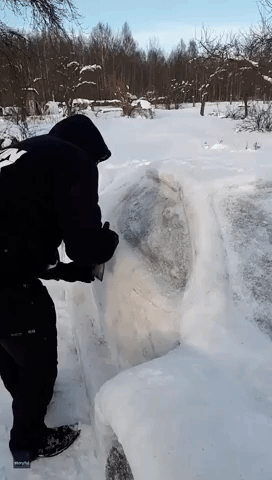 Lithuanian Couple Sculpt Their Own Million-Dollar Ferrari Out of Snow