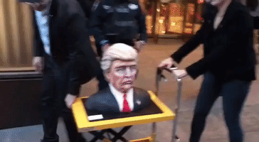 Donald Trump Cake Is Wheeled Through Manhattan