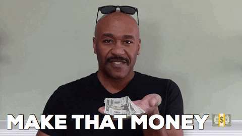 Celebrity gif. Robert E Blackmon holds up a short stack of dollar bills and makes it rain. His eyes are squinted and his tongue sticks out of his mouth in a playful way. Text, "Make that money."