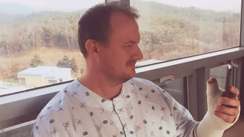 Hospitalized Dad Sees Baby Daughter for First Time, via Smartphone