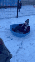 Kids Enjoy Snow in School Playground as Cold Persists in Northern Ireland