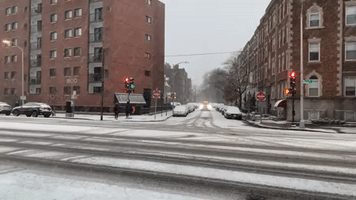 Snow Gathers on Roads Near Harvard University