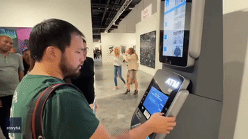 Cheeky Project at Art Basel Miami Beach Displays Attendees' Bank Balances