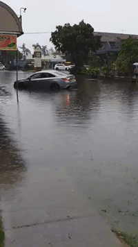 Car Stranded in Byron Bay Street as Flash Flooding Hits New South Wales Coast