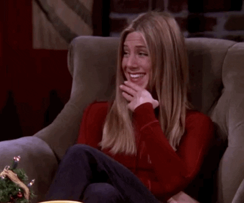 Friends gif. Jennifer Aniston as Rachel looking very chuffed. She sticks her tongue out slightly and cutely while giving a thumbs up.
