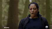 TV gif. Riann Steele as Finola on Debris breathes deeply and frowns, appearing shocked .