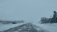 Blizzard Conditions Lower Visibility on Iowa Roads