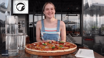 A Pizza the Action: Competitive Eater Demolishes 18-Inch Pizza in Just Over Four Minutes