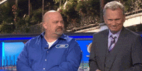 shrugging pat sajak GIF by Wheel of Fortune