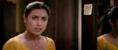 Movie gif. Rani Mukerji as Meenakshi in Aiyyaa frowns and dramatically turns her head to rest it on her arm, leaning on a wall.