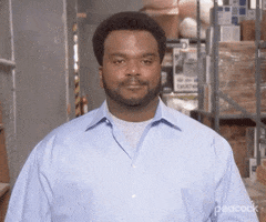 The Office gif. Craig Robinson as Darryl raises and clenches his fists in frustrated, sarcastic joy. Text, "Yay!"