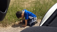 Poor Kid Isn't Able to Cope With Winding Italian Roads