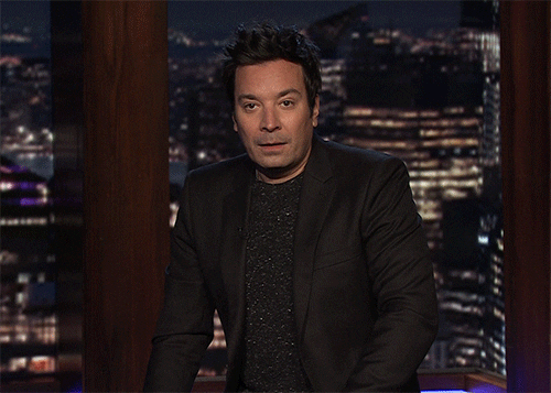 The Tonight Show gif. Jimmy Fallon looks at us and then blinks. He huffs out air and chuckles as if hearing something ridiculous. He says, “Oh my…” 