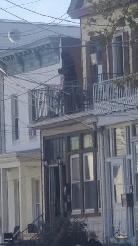 Police Officer Catches Infant Dangling From Balcony in Jersey City