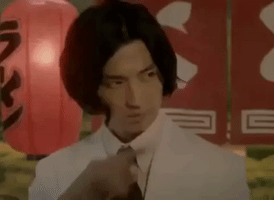 japan flips hair GIF