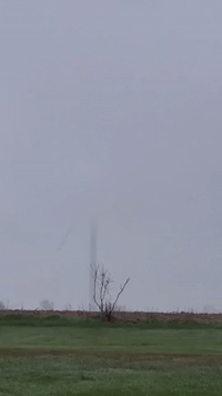 Dense Fog Obscures Wind Turbine in Eastern Michigan