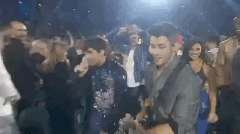 Jonas Brothers Kiss GIF by Billboard Music Awards