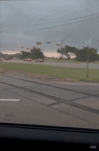 Traffic Lights Whip Around as Storms Bring Strong Winds to Coastal Texas