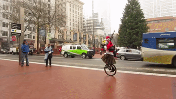 Unicycling Santa Plays 'Ode to Joy' on Flaming Bagpipes