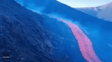 Mesmerizing Stream of Lava Flows Down Sicily's Mount Etna Volcano