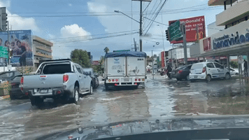 Vehicles Navigate Flooded Roads in Guadalajara, Mexico