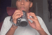 sykeen camera caught rodrick pointing at camera GIF