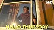 Celebrity gif. Neil Primrose from the band Travis looks out of a window with the sun shining on him. He has a satisfied smile on his face as he backs away from the window. Text, “Hello Thursday.”