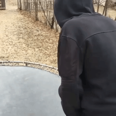 Kid Breaks the Ice on Frozen Trampoline in One Epic Bounce