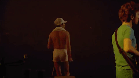 freddie mercury strut GIF
