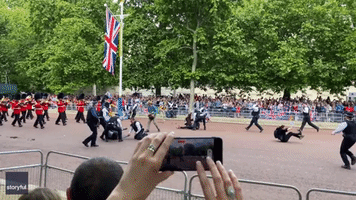 Band Marches on as Police Intercept Protesters at Queen's Jubilee Parade