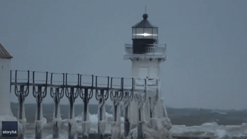 Large Waves Slam Pier on Lake Michigan as Arctic Front Blows Through