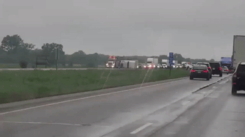 Trucks Flipped During Tornado-Warned Storm Near Tomah, Wisconsin
