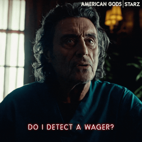 TV gif. Ian Mcshane as Odin on American Gods looks weary and tired, but has a stern expression on his face as he says, “Do I detect a wager?”